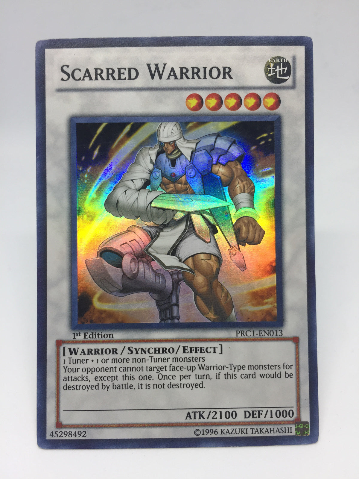 Scarred Warrior / Super - PRC1-EN013 - 1st — Transcend Cards